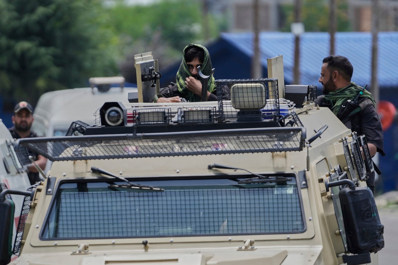 Jammu and Kashmir Special Operation Group (SOG) personnel arrive near the site of a gun battle on the outskirts of Srinagar, Indian controlled Kashmir, Monday, July 28, 2025. (AP Photo/Mukhtar Khan)