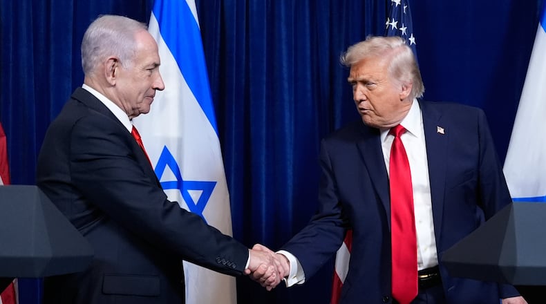 President Donald Trump shakes hands with Israel's Prime Minister Benjamin Netanyahu at the end of a news conference at Mar-a-Lago, Dec. 29, 2025, in Palm Beach, Fla. (AP Photo/Alex Brandon, File)