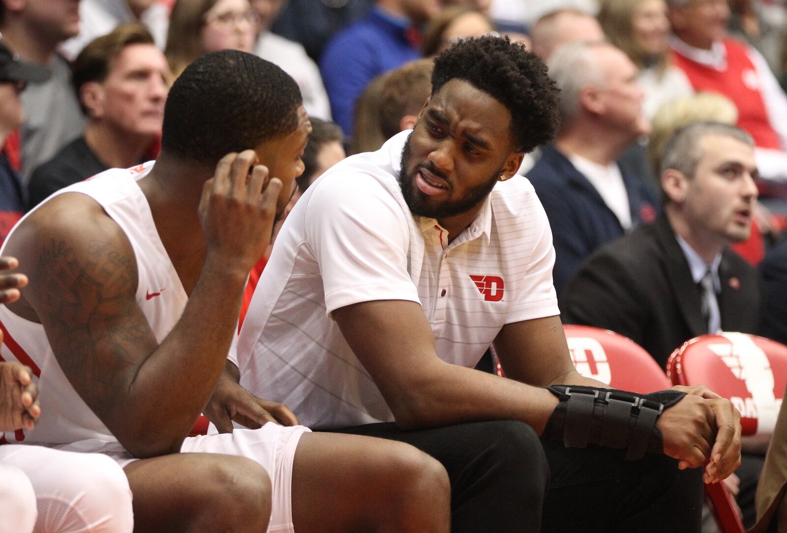 Dayton’s Josh Cunningham talks to Trey Landers during a game against Coppin State on Saturday, Nov. 10, 2018, at UD Arena.