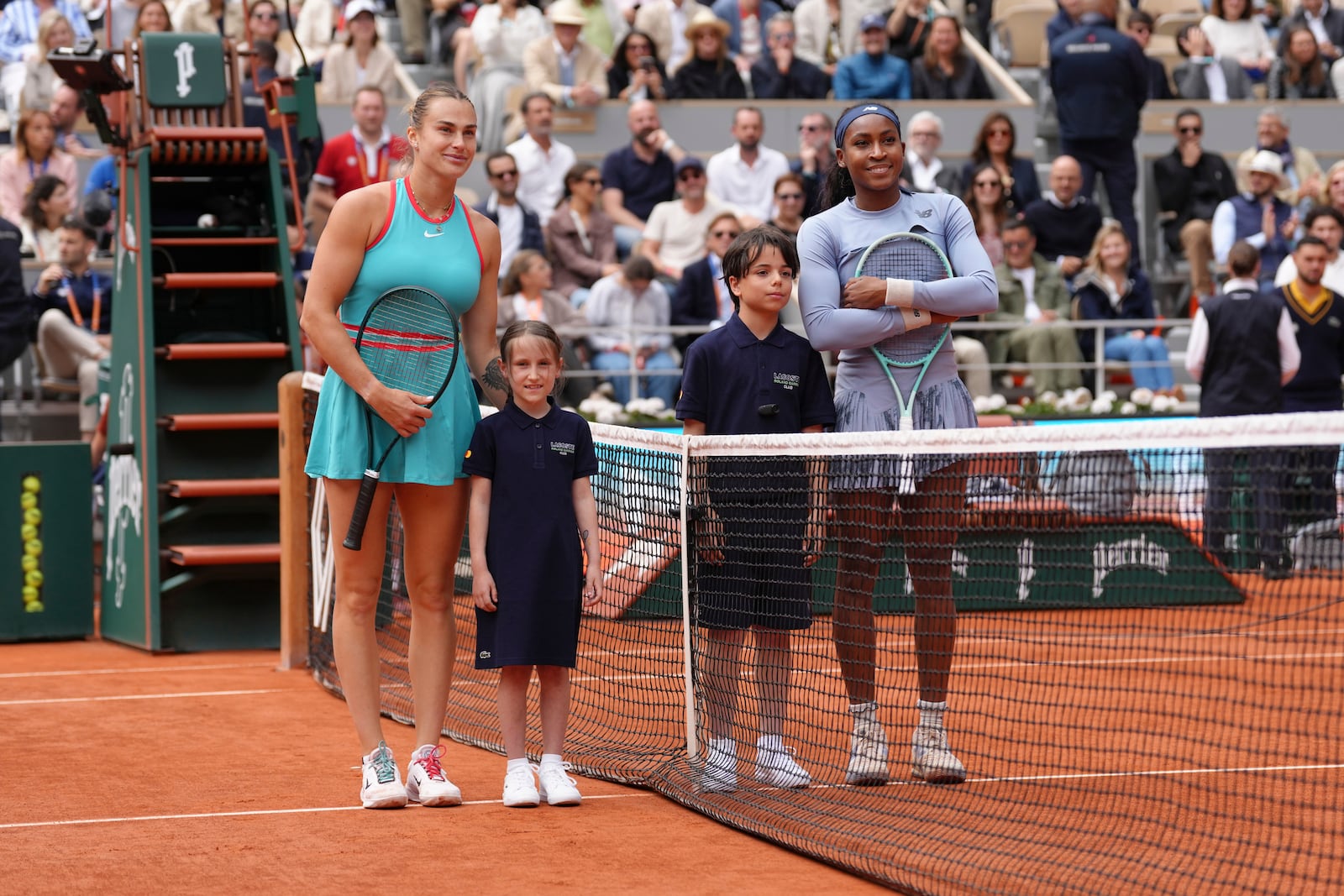 Aryna Sabalenka of Belarus, left, and Coco Gauff of the U.S. pose for a picture before their final match of the French Tennis Open at the Roland-Garros stadium in Paris, Saturday, June 7, 2025. (AP Photo/Aurelien Morissard)