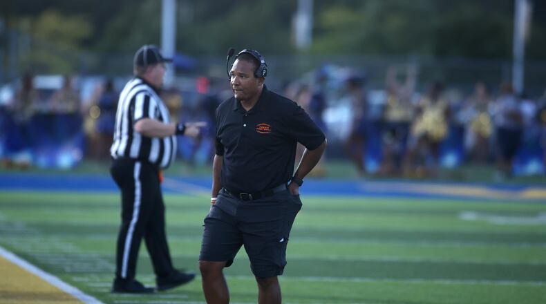 Beavercreek's Marcus Colvin coaches during a game against Beavercreek on Friday, Sept. 15, 2023, in Springfield. David Jablonski/Staff