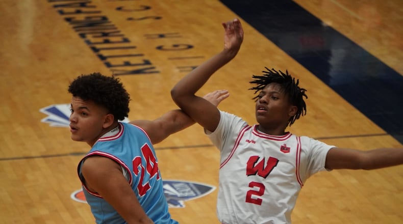 Lakota West's Joshua Tyson (2) puts up a shot over Fairmont's Jayden McGraw (24) at the 22nd Annual The Beacon Orthopedics Flyin’ to the Hoop Invitational on Monday, Jan. 20, 2025 at Trent Arena. CHRIS VOGT / CONTRIBUTED