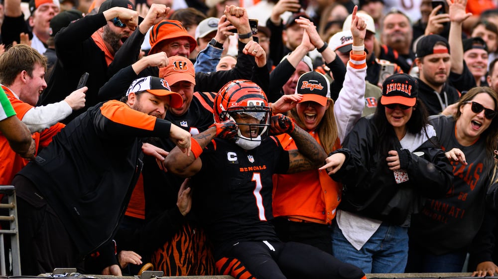 Cincinnati Bengals wide receive Ja'Marr Chase celebrates a touchdown catch in the second quarter during their game against the Arizona Cardinals on Sunday, Dec. 28 at Paycor Stadium. JEREMY MILLER / CONTRIBUTED PHOTO