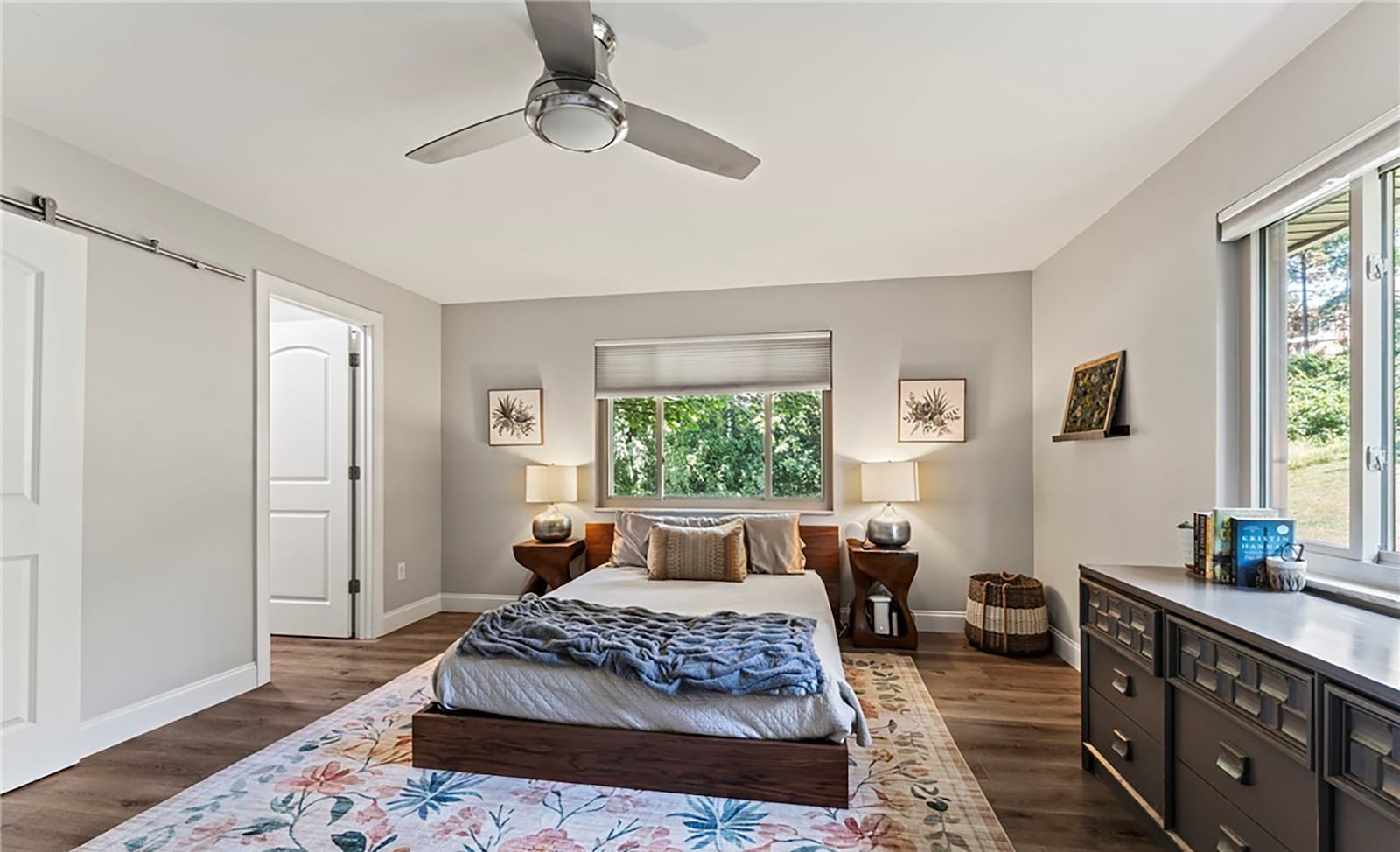 The primary bedroom suite has LVT flooring and a ceiling fan. It also has a spa like ensuite bathroom with walk in shower. CONTRIBUTED