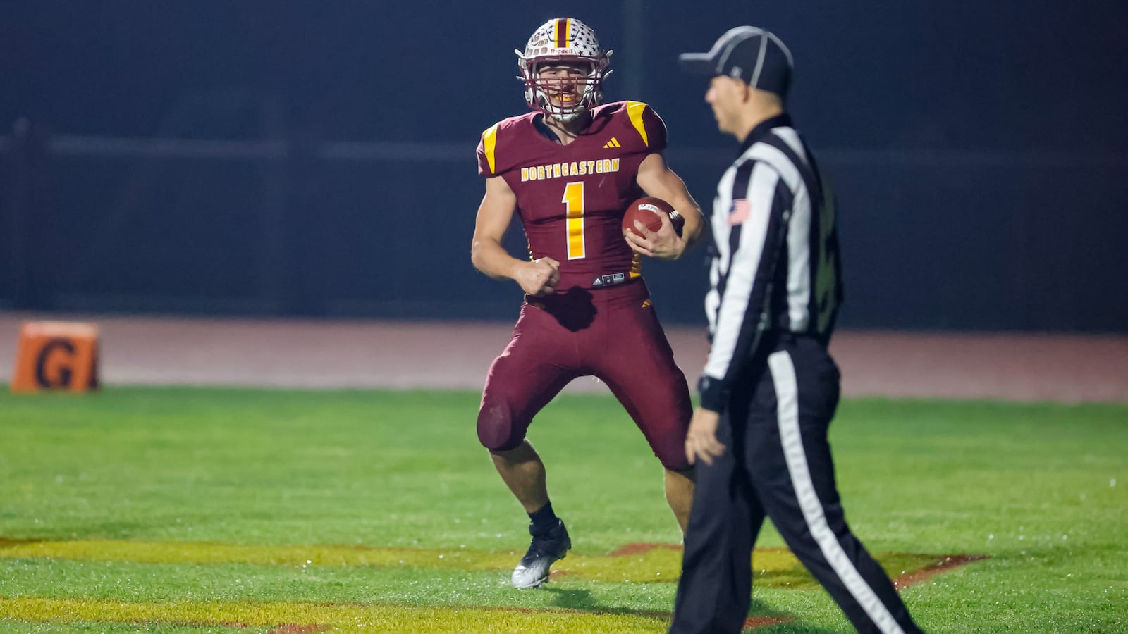 Northeastern High School senior Cody Houseman celebrates after scoring a touchdown during their 59-0 victory over Ironton Rock Hill in a Division VI, Region 24 quarterfinal game on Friday, Nov. 7 at Conover Stadium in Springfield. MICHAEL COOPER / STAFF PHOTO