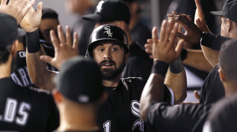 The White Sox’s Adam Eaton celebrates with teammates after scoring on a sacrifice fly by Melky Cabrera during the first inning against the Kansas City Royals in September. (AP Photo/Nam Y. Huh, File)