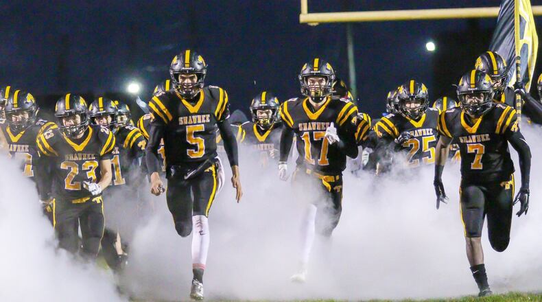 The Shawnee High School football team runs onto the field before its game against Jonathan Alder on Friday, Oct. 26, 2018. The Braves will travel to Clinton-Massie for a Division IV, Region 16 quarterfinal game at 7 p.m. Saturday. MICHAEL COOPER / CONTRIBUTED
