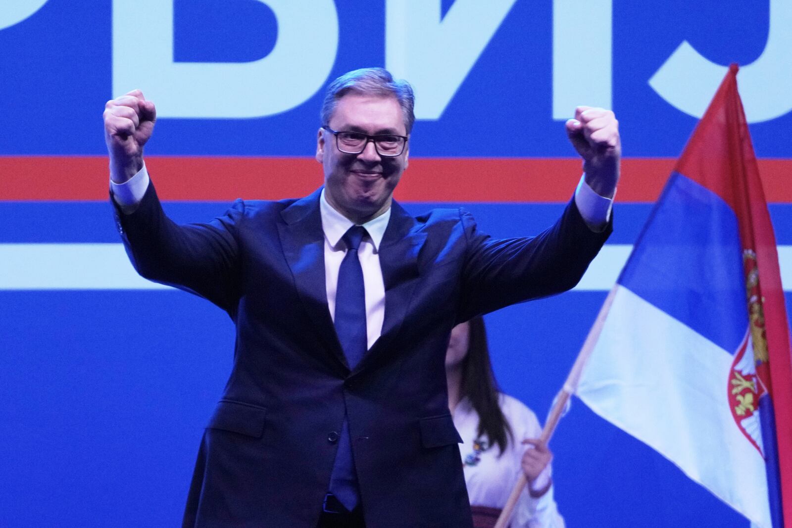 Serbia's President Aleksandar Vucic greets his supporters gathered during a huge rally in his support, apparently designed to counter student-led gatherings in Belgrade, Serbia, Saturday, April 12, 2025. (AP Photo/Darko Vojinovic)
