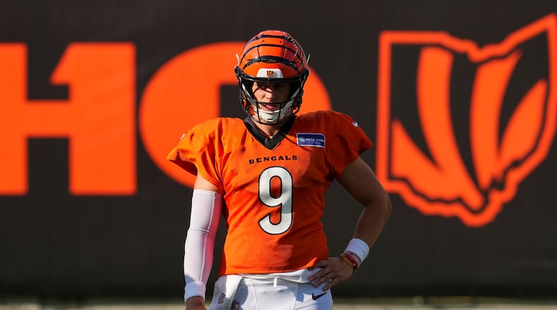 Cincinnati Bengals quarterback Joe Burrow looks on during practice at the team's NFL stadium, Saturday, Aug. 2, 2025, in Cincinnati. (AP Photo/Jeff Dean)