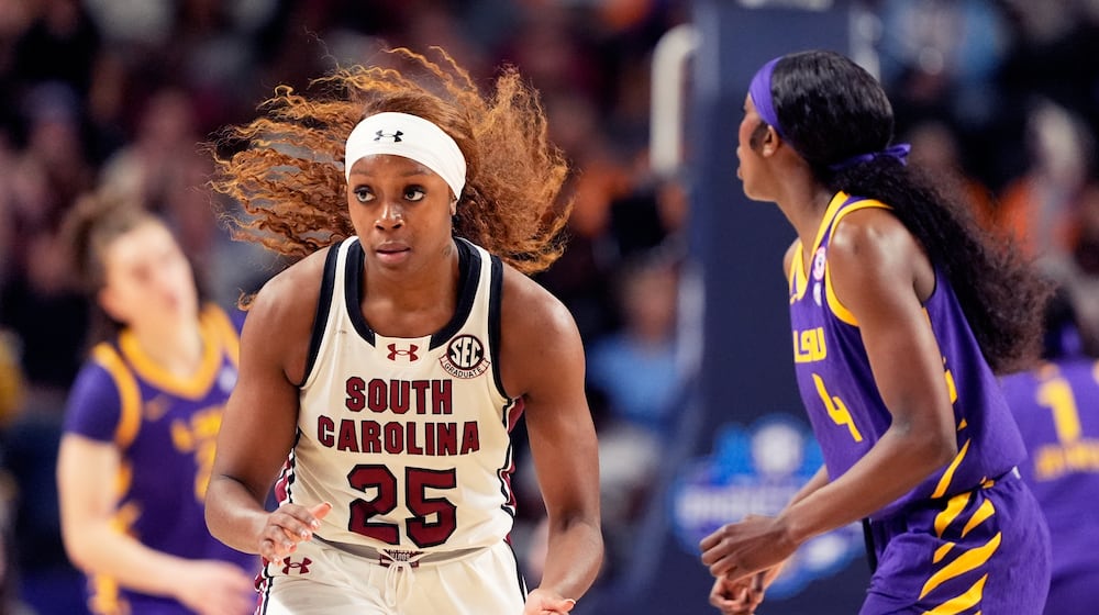 South Carolina guard Raven Johnson celebrates after scoring against LSU during the first half of an NCAA college basketball game in the semifinals of the Southeastern Conference tournament, Saturday, March 7, 2026, in Greenville, S.C. (AP Photo/Chris Carlson)