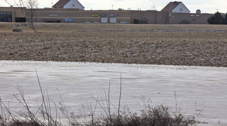 Land behind Walmart in Urbana could be utilized for a proposed development that could build up to 513 housing units. BILL LACKEY/STAFF