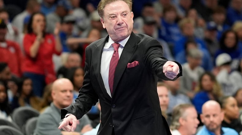 St. John's head coach Rick Pitino speaks during the first half of an NCAA basketball game against Kentucky, Saturday, Dec. 20, 2025, in Atlanta. (AP Photo/Mike Stewart)