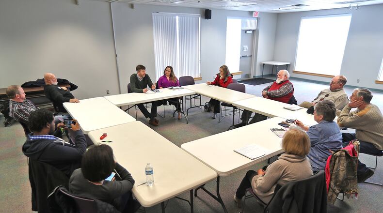 Staff from U.S. Sen. Sherrod Brown’s office met with Champaign County farmers Thursday afternoon to discuss the latest version of the farm bill and what should be included. Bill Lackey/Staff