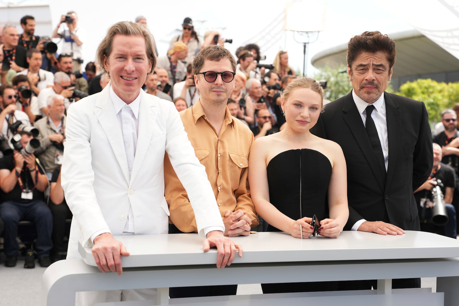 Director Wes Anderson, from left, Michael Cera, Mia Threapleton and Benicio del Toro pose for photographers at the photo call for the film 'The Phoenician Scheme' at the 78th international film festival, Cannes, southern France, Monday, May 19, 2025. (Photo by Scott A Garfitt/Invision/AP)