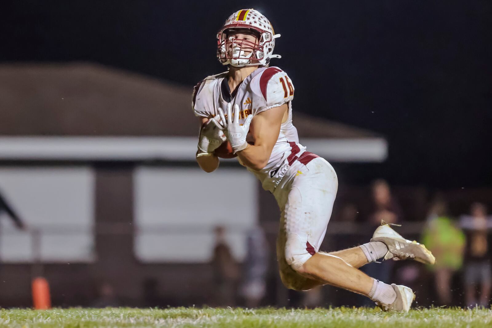 Northeastern High School senior Kaleb Moone catches a touchdown pass during the fourth quarter of their game against West Jefferson on Friday, Sept. 26. The Jets fell to the Roughriders 42-36 in overtime. MICHAEL COOPER / STAFF