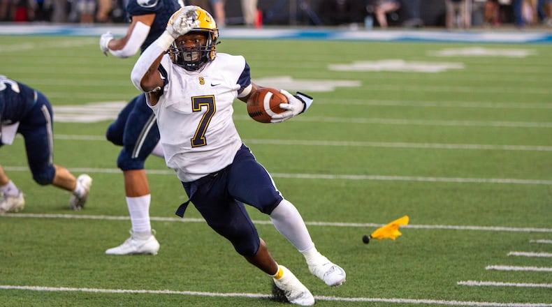 Springfield's Jayvin Norman breaks loose on a 32-yard run in the first quarter into the red zone that was called back on a holding penalty against Fairmont. Jeff Gilbert/CONTRIBUTED