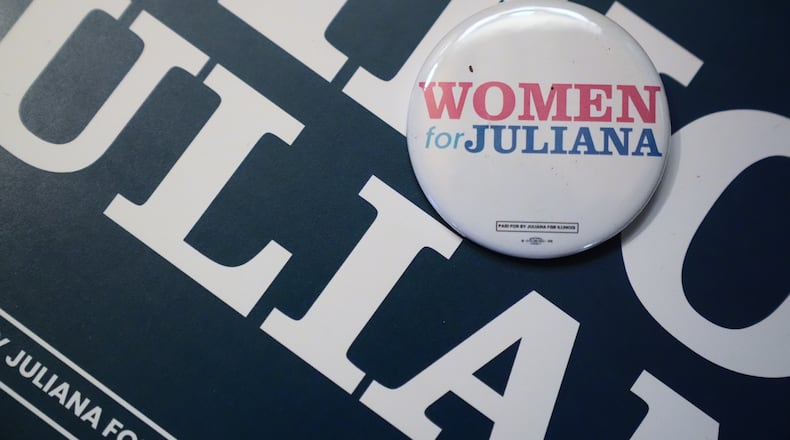 A pin reading "women for Juliana" is displayed during a primary election night watch party for Illinois Lt. Gov. Juliana Stratton, a Democratic candidate for U.S. Senate, Tuesday, March 17, 2026, in Chicago. (AP Photo/Erin Hooley)