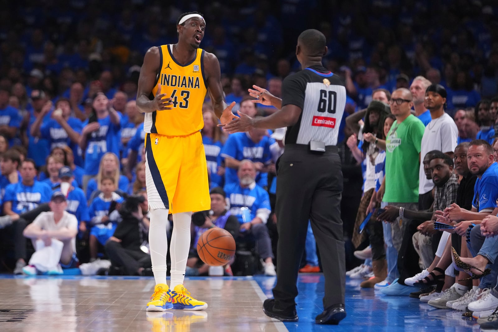 Indiana Pacers forward Pascal Siakam (43) talks with referee James Williams (60) during the second half of Game 2 of the NBA Finals basketball series against the Oklahoma City Thunder Sunday, June 8, 2025, in Oklahoma City. (AP Photo/Julio Cortez)