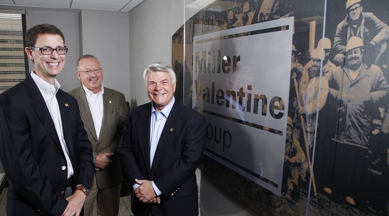 Miller Valentine leaders say they built 80 million square feet of commercial space over 50 years for a reason. They have diversified the business, treated customers right and planned well, they say. Now, the future includes more “mixed-use developments” — a blend of living, working and retail spaces closer to the urban center. A look at a Dayton-based real estate company’s golden anniversary. From left to right are Ed Blake, Dave Dickerson and Bill Krul. TY GREENLEES / STAFF