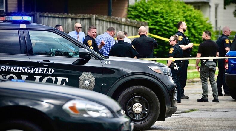 The Springfield Police Division is investigating a crash and possible shooting on South Limestone Street Wednesday, May 14, 2025. MARSHALL GORBY/CONTRIBUTED