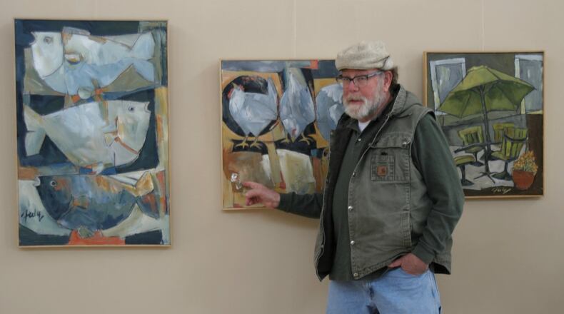 Douglas Fiely, seen here discussing his works at The Art Gallery at the Centerville Police Department in 2017, died Sept. 11. He was 74. CONTRIBUTED
