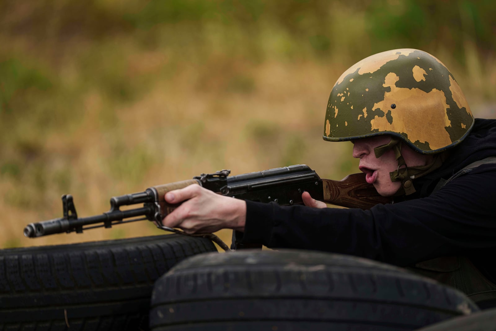 A Ukrainian 3rd Assault Brigade recruit trains at the polygon in Kyiv region, Ukraine, on Wednesday, July 16, 2025. (AP Photo/Evgeniy Maloletka)