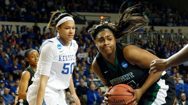 Wright State Raiders forward Kourtni Perry (34) pulls in a defensive rebound during the first half of the first-round NCAA Tournament game at Memorial Coliseum Saturday, March 12, 2014 in Lexington, Ky. Photo by Amy Wallot