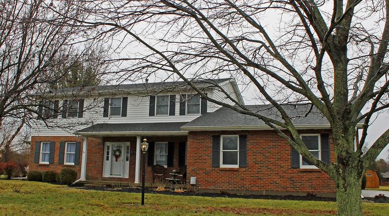 Built in 1988, this 4-bedroom home offers approximately 2,390 sq. ft. of living space. The home sits on a .79-acre lot and offers a neutral color scheme and an open concept floor plan. CONTRIBUTED PHOTO BY VICKIE KAPNAS