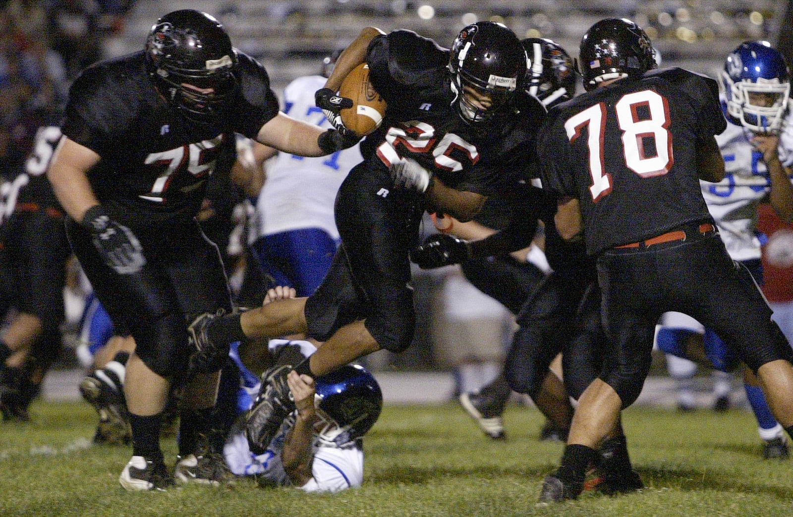 West Carrollton High School  WR Randy Stites (25) breaks through Miamisburg defense Friday night at West Carrollton. JIM NOELKER /  STAFF PHOTO