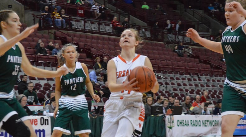Caitlin McEldowney of Versailles (with ball). Versailles defeated Elyria Catholic 63-47 in a girls high school basketball D-III state semifinal at OSU’s Schottenstein Center on Thursday, March 15, 2018. ERIC FRANTZ / CONTRIBUTOR