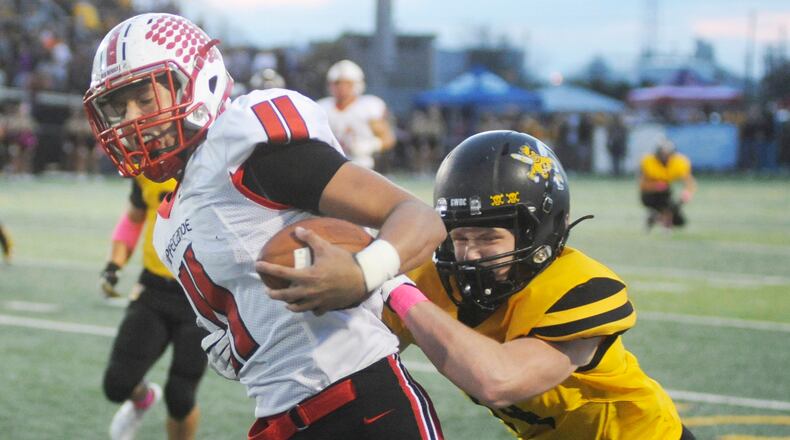 Tippecanoe senior Josh Walland (left) had five catches for 74 yards last season. MARC PENDLETON / STAFF
