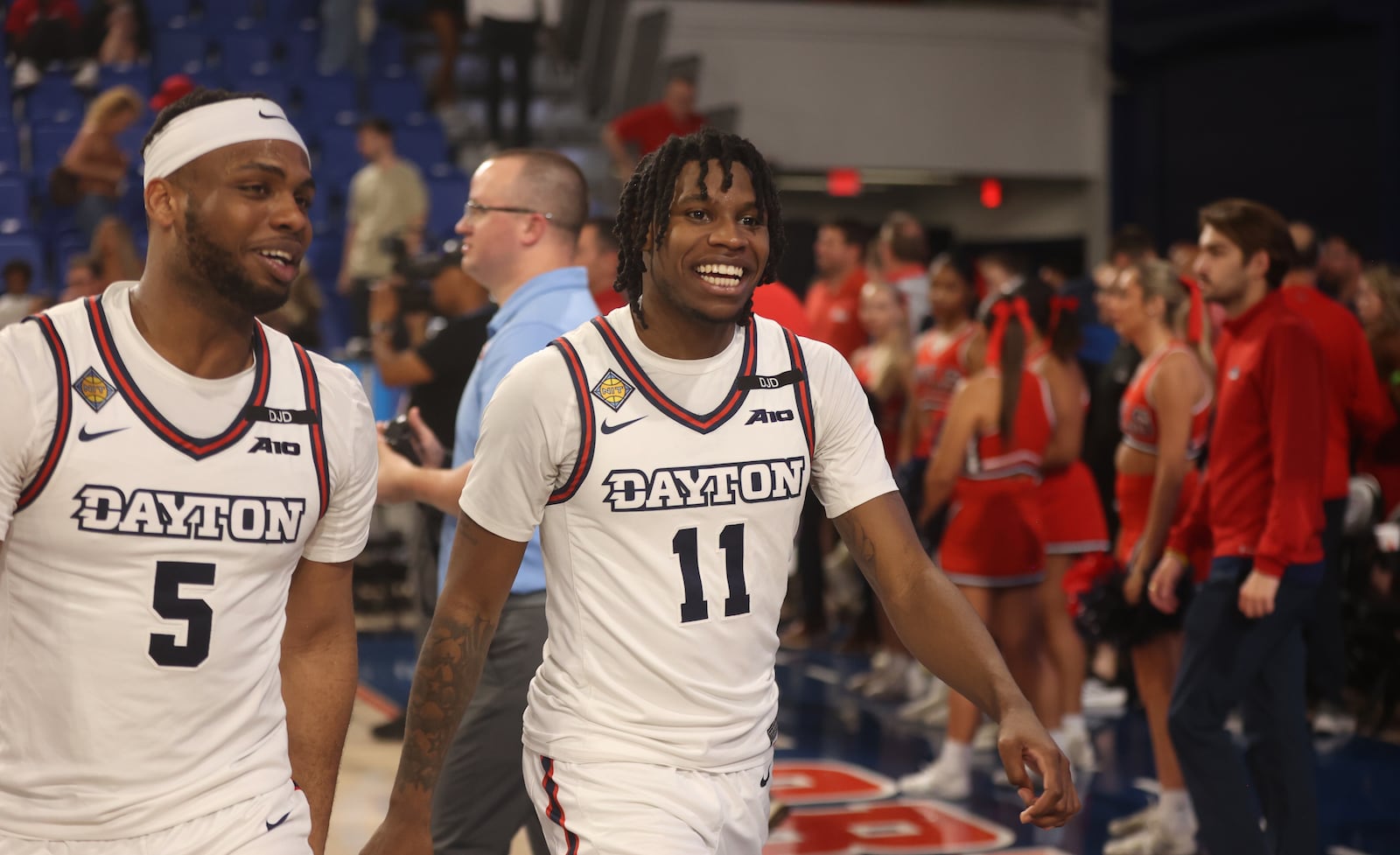Dayton's Posh Alexander and Malachi Smith leave the court after a victory against Florida Atlantic in the first round of the NIT on Wednesday, March 19, 2025, at Baldwin Arena in Boca Raton, Fla. David Jablonski/Staff