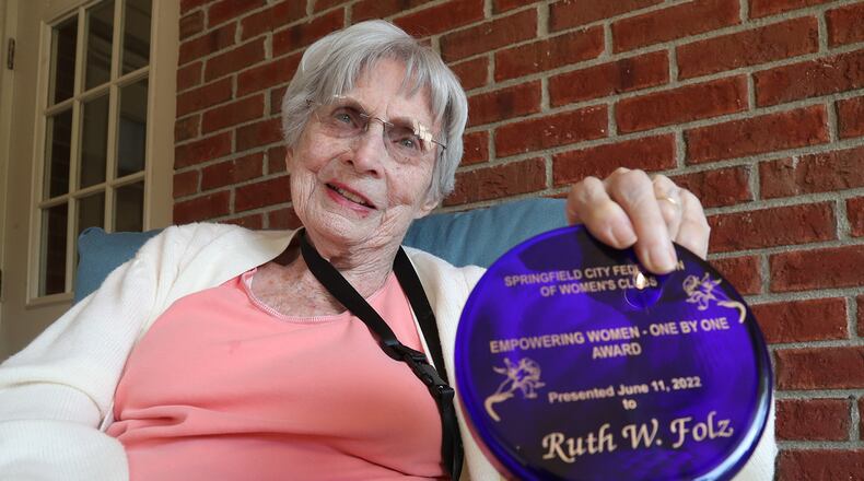 Ruth Folz with her award from the Springfield Women's Club. BILL LACKEY/STAFF