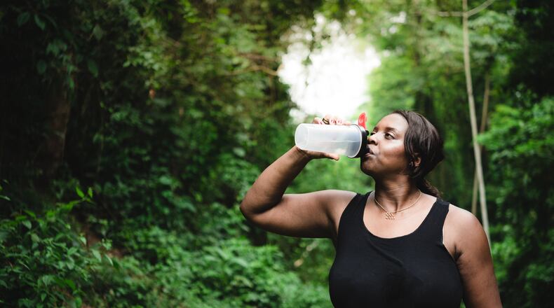 When temperatures rise. remember to drink plenty of fluids, especially when exercising. ISTOCK