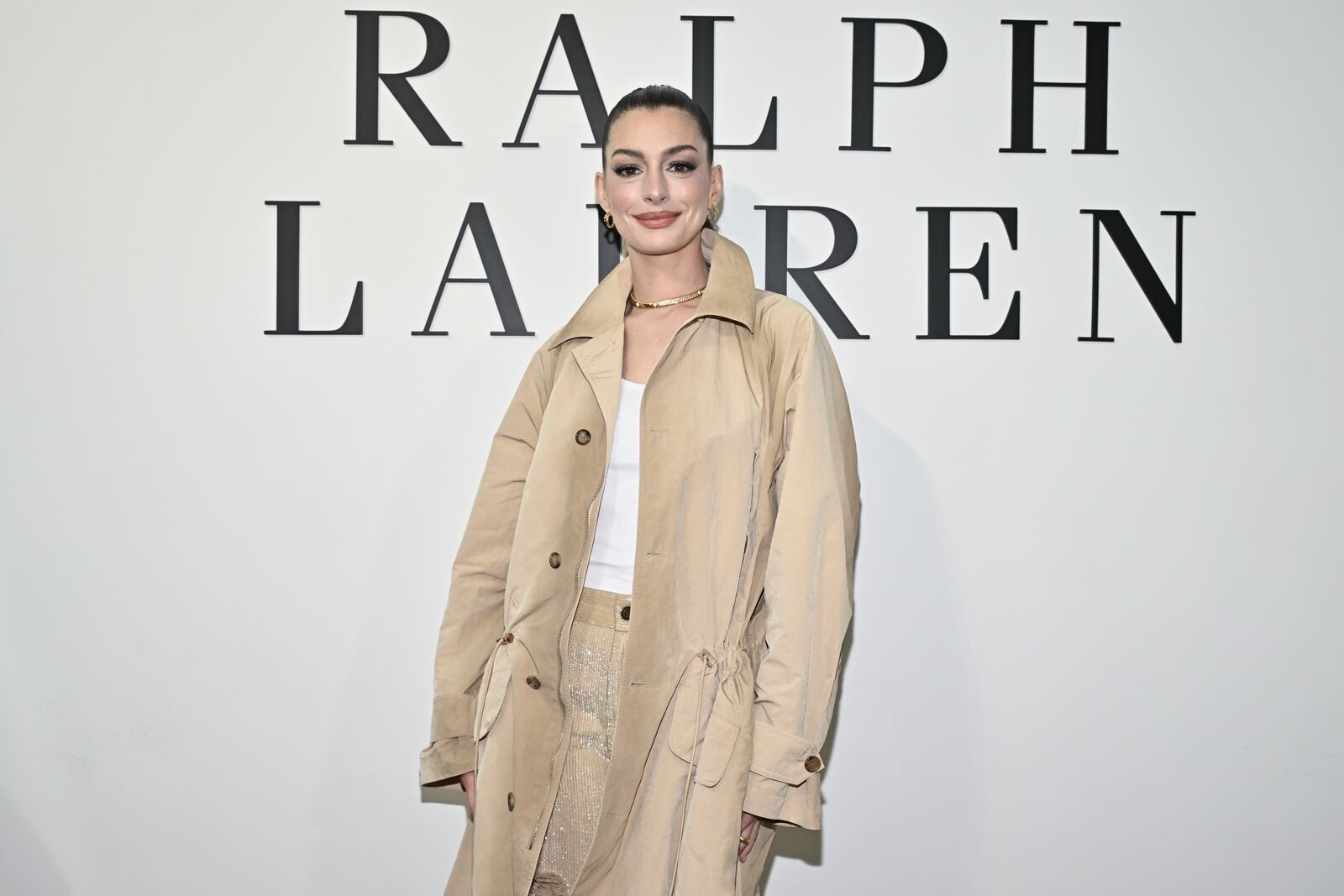 Anne Hathaway arrives at the Ralph Lauren Fall 2025 presentation on Thursday, April 17, 2025, in New York. (Photo by Evan Agostini/Invision/AP)
