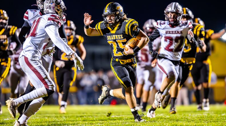 Shawnee High School senior T.J. Meeks runs the ball during their game against Urbana on Friday night in Springfield. The Braves won 42-7. Michael Cooper/CONTRIBUTED