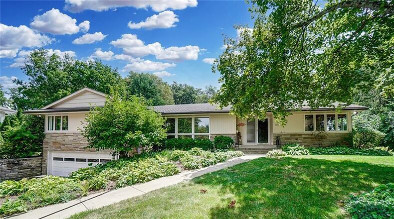 This ranch-style home, which has about 2,790 sq. ft. of living space with a full, finished lower level, includes 4 bedrooms and refinished hardwood flooring throughout main level. The home has an attached, 3-car garage and heavy landscaping. CONTRIBUTED PHOTO