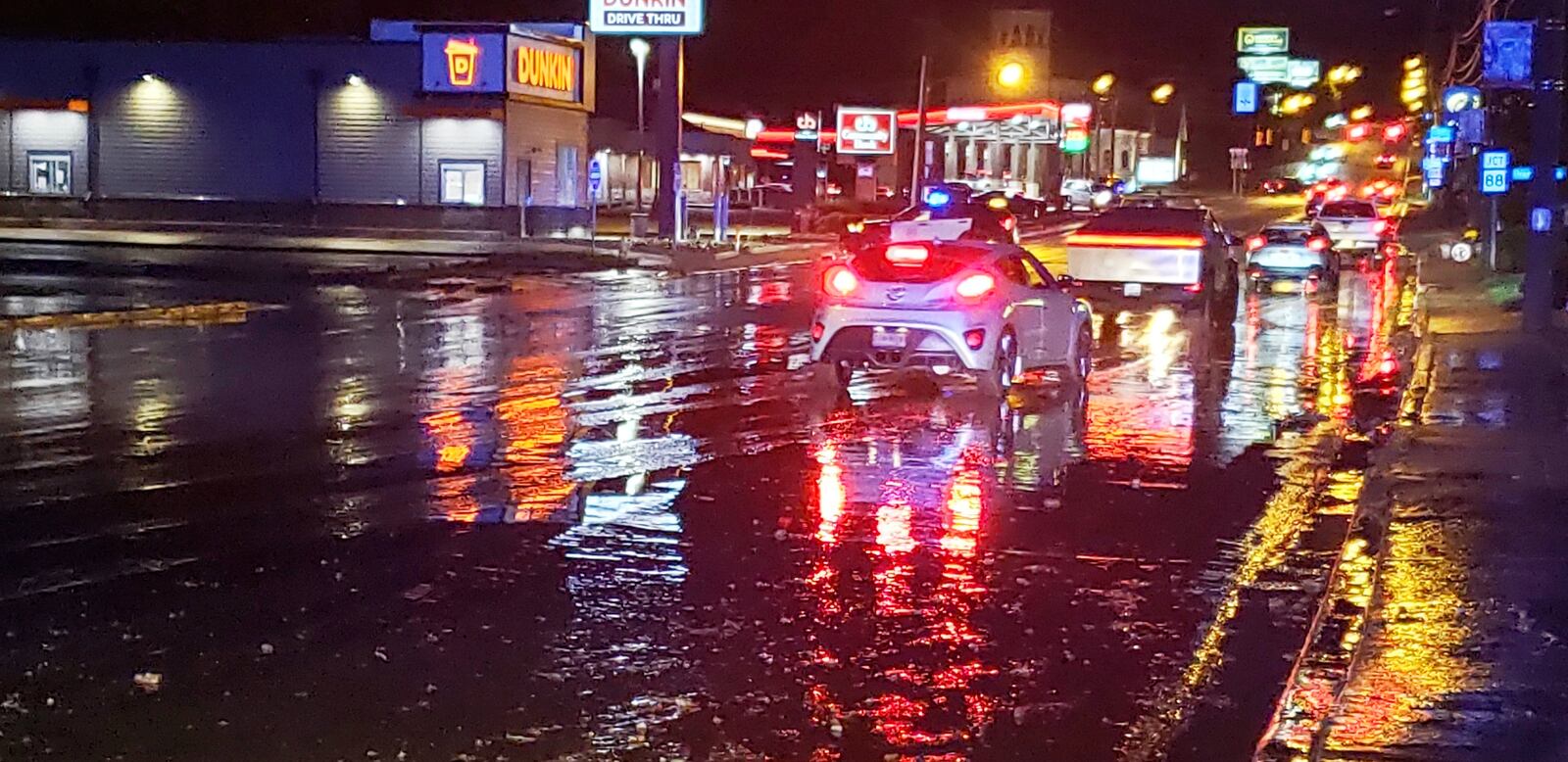 Floodwater covers a roadway off East Bethlehem Boulevard in Ohio County, W.Va., Thursday, June 26, 2025. (John McCabe/The Intelligencer via AP)