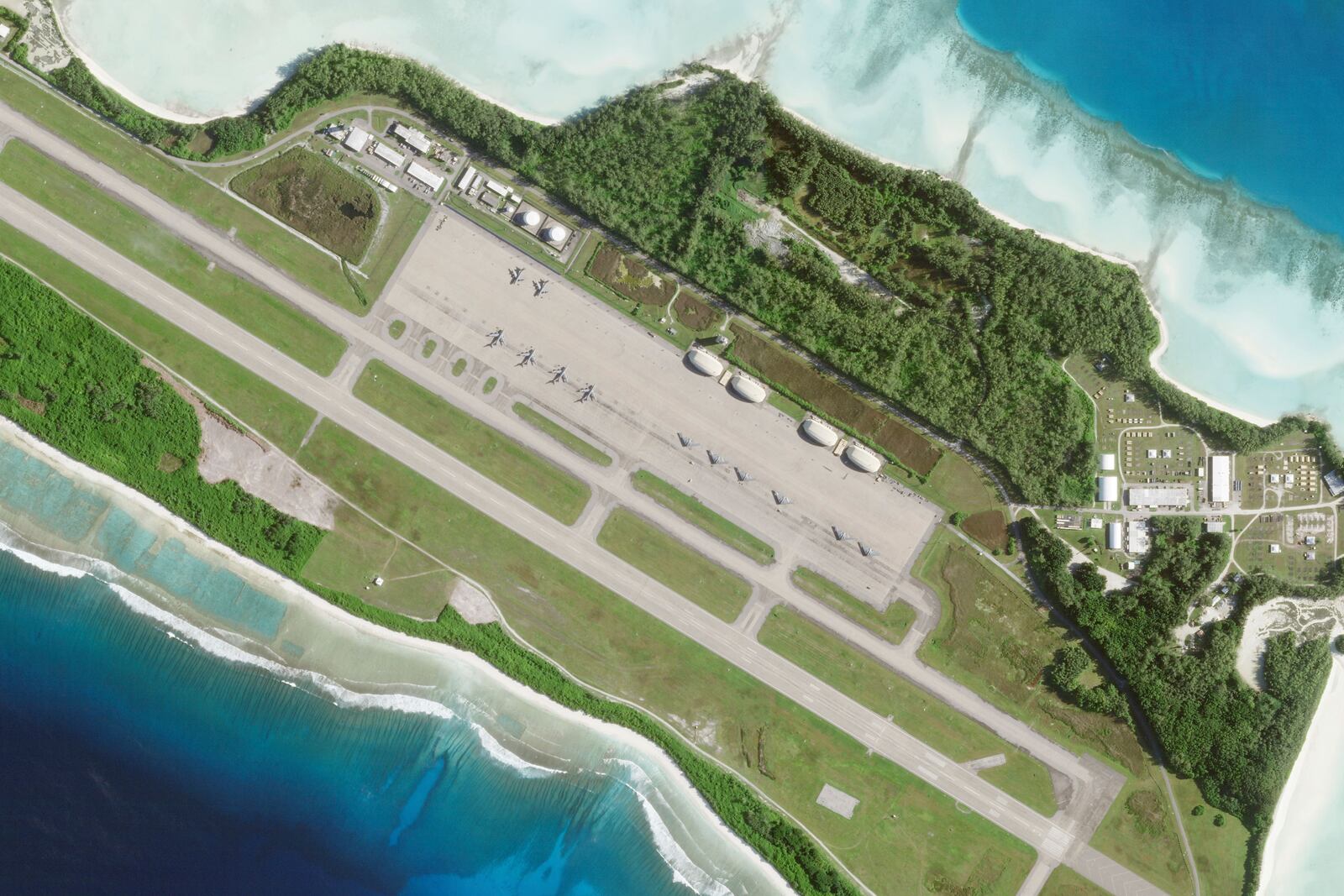 This satellite photo from Planet Labs PBC shows six B-2 stealth bombers parked at Camp Thunder Cove in Diego Garcia on Wednesday, April 2, 2025, as a U.S. airstrike campaign continues against Yemen's Houthi rebels. (Planet Labs PBC via AP)
