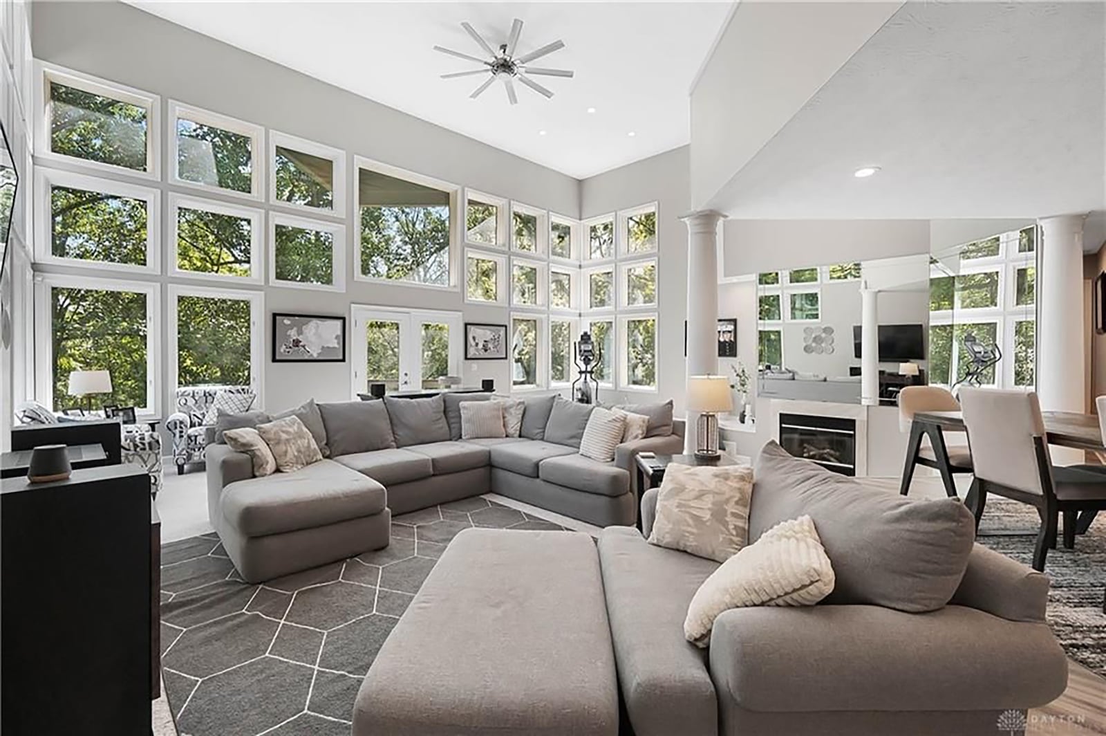 The two story great room has carpeting and a sunken fireplace with conversation pit. CONTRIBUTED