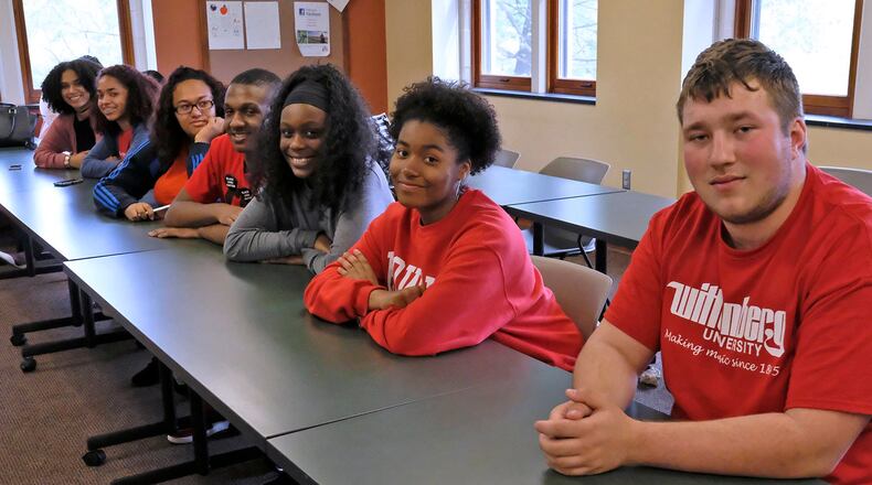Upward Bound students and alumni gathered in Blair Hall at Wittenberg University this month to talk about the program and what they think of the federal government rejecting Upward Bound grant application because of a typing error. Bill Lackey/Staff