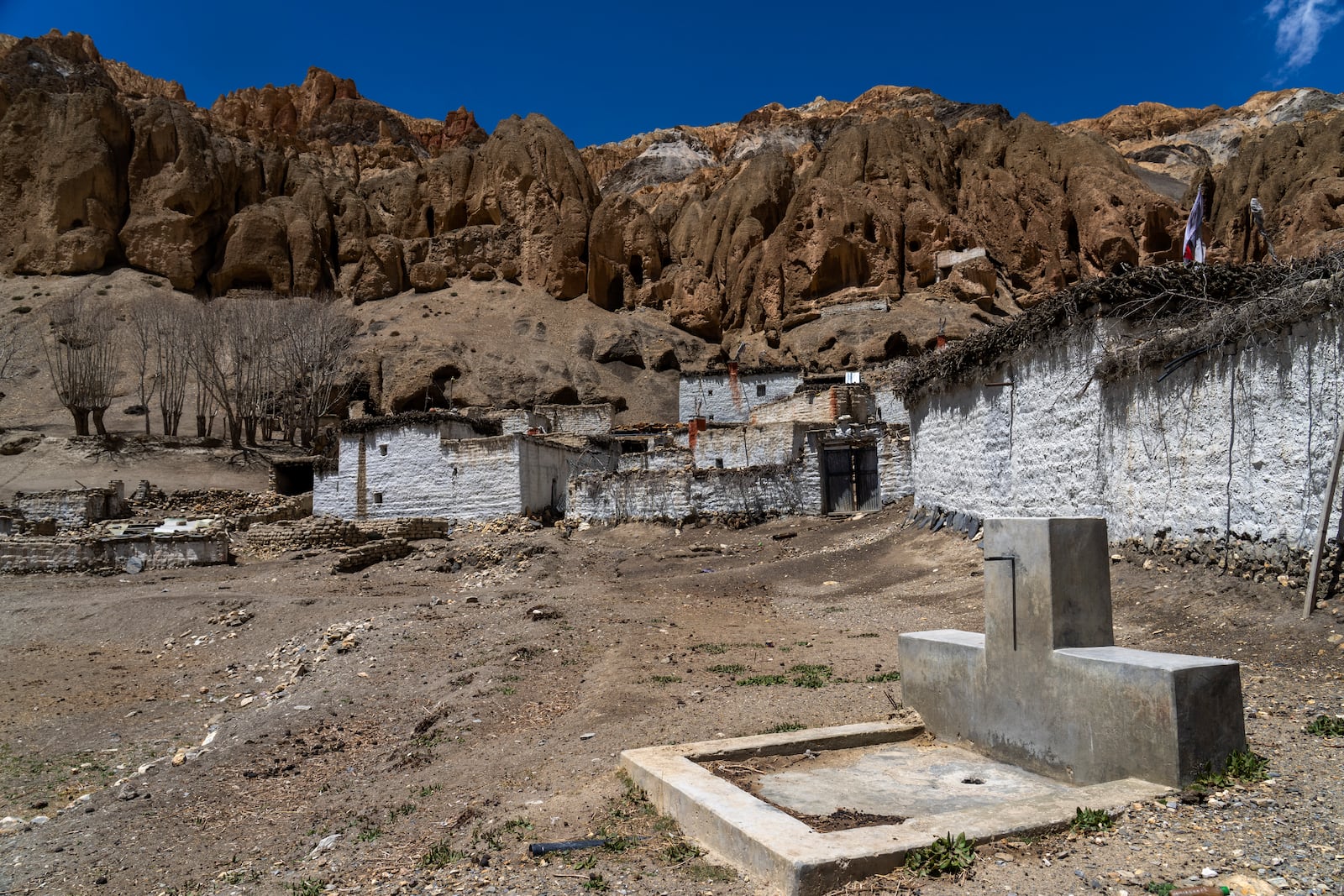 A dried up water tap is seen in the abandoned village of Samjung, Mustang region, 462 kilometers (288 miles) west of Kathmandu, Nepal, Friday, April 18, 2025. (AP Photo/Niranjan Shrestha)