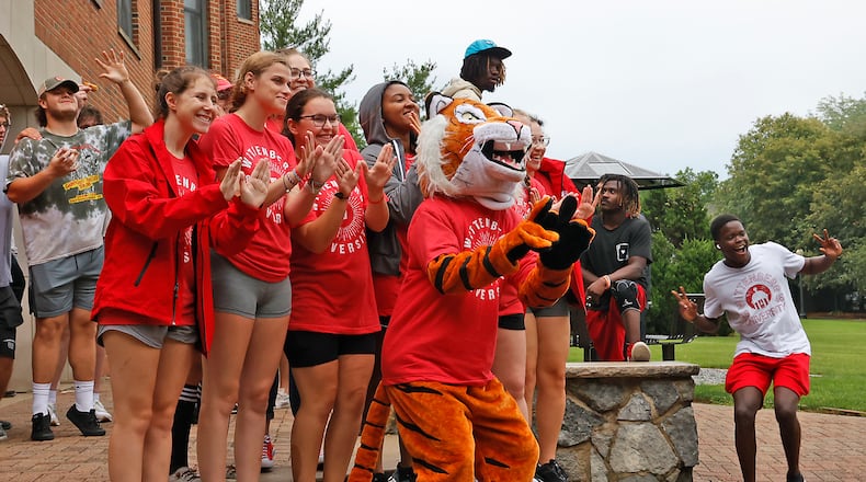 Wittenberg University will host its annual Welcome Week from Aug. 22-25. In this file photo from last year, Wittenberg students and staff helped incoming freshmen move there stuff into the dorms during "Move-In Day" on campus. FILE/BILL LACKEY/STAFF