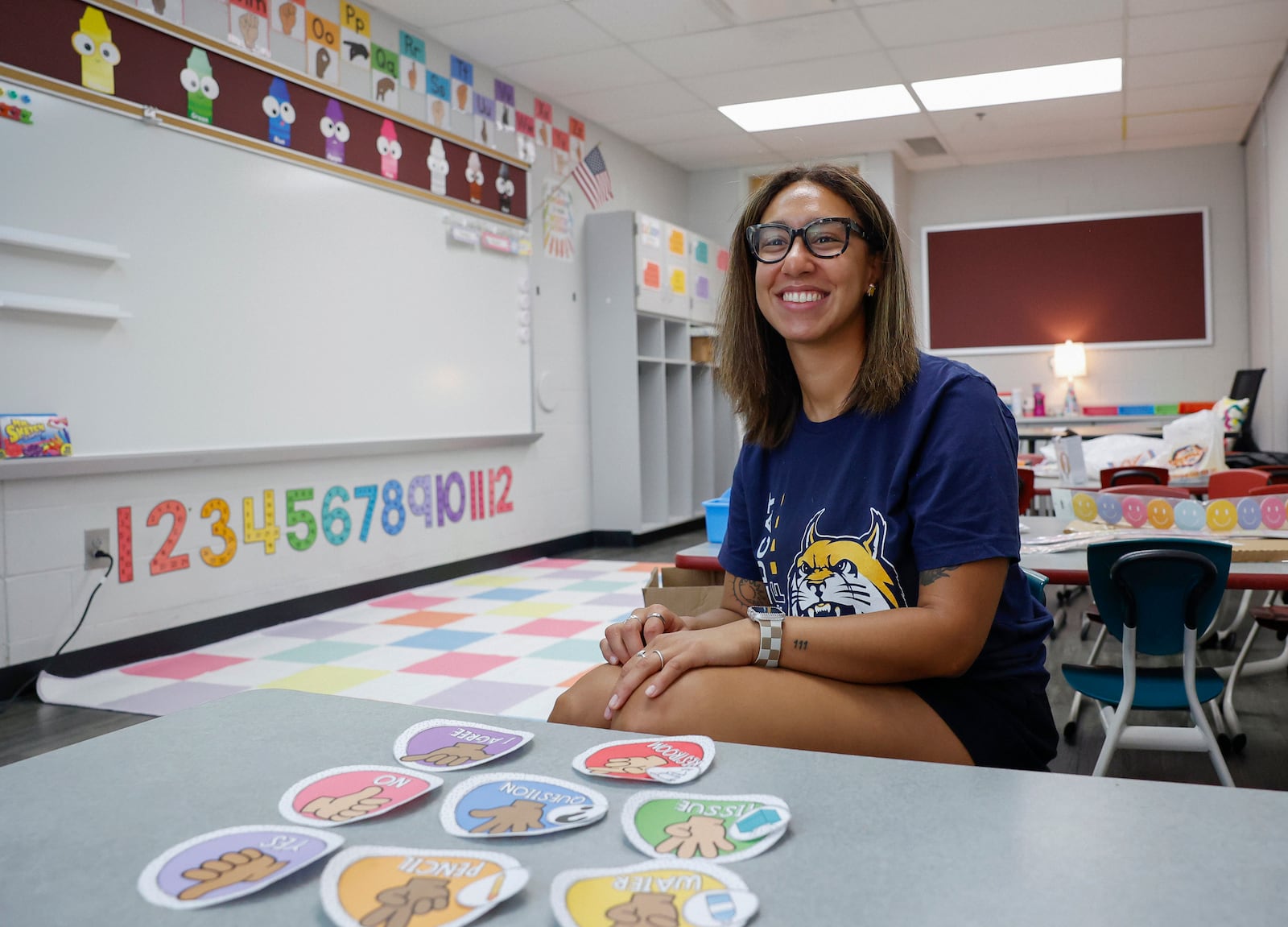 New first grade teacher Jenee’ Jolly poses for a portrait in her classroom at Lincoln Elementary School on Wednesday, August 6, 2025, in Springfield. She's a recent graduate of Wright State University. JOSEPH COOKE/STAFF