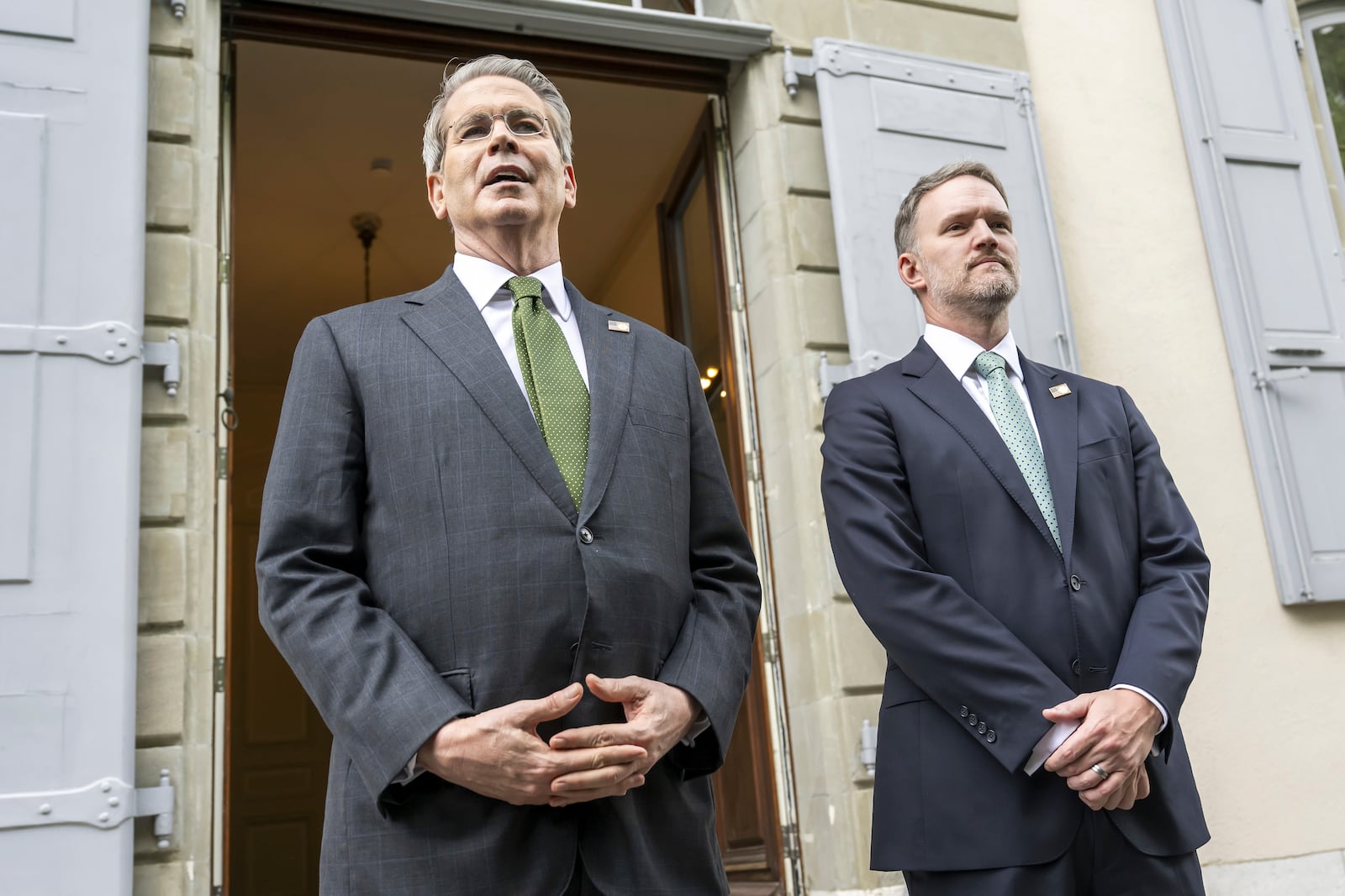 US Secretary of the Treasury Scott Bessent, left, and US Trade Representative Jamieson Greer meet the media on the second day of a bilateral meeting between the United States and China, in Geneva, Switzerland, Sunday, May 11, 2025. (Martial Trezzini/Keystone via AP)