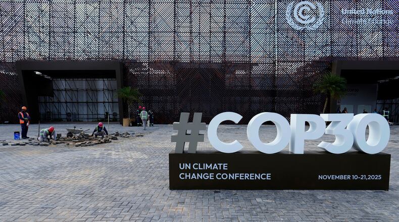 A sign for the upcoming COP30 U.N. Climate Summit sits outside of the press center in Belem, Brazil, Monday, Nov. 3, 2025. (AP Photo/Eraldo Peres)