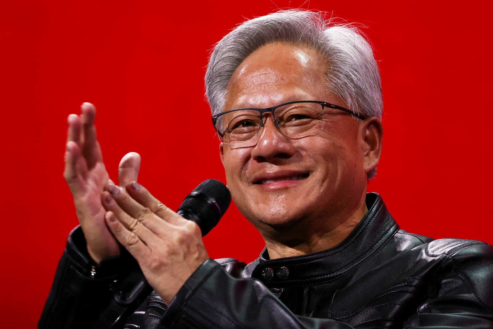 Nvidia CEO Jensen Huang attends a round table discussion at the VivaTech fair dedicated to innovation and startups in Paris, Wednesday, June 11, 2025. (Sarah Meyssonnier/Pool via AP)