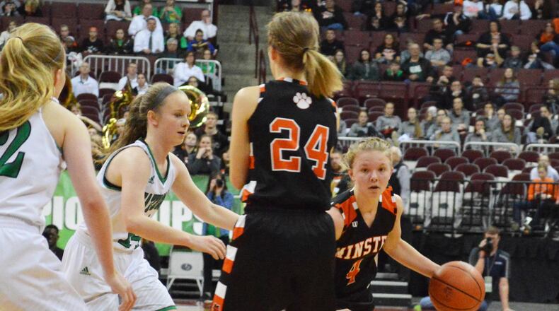 Ivy Wolf (with ball) gets a screen from Taylor Kogge. Minster defeated Waterford 46-31 in a girls high school basketball D-IV state semifinal at OSU’s Schottenstein Center in Columbus on Thursday, March 15, 2018. ERIC FRANTZ / CONTRIBUTOR