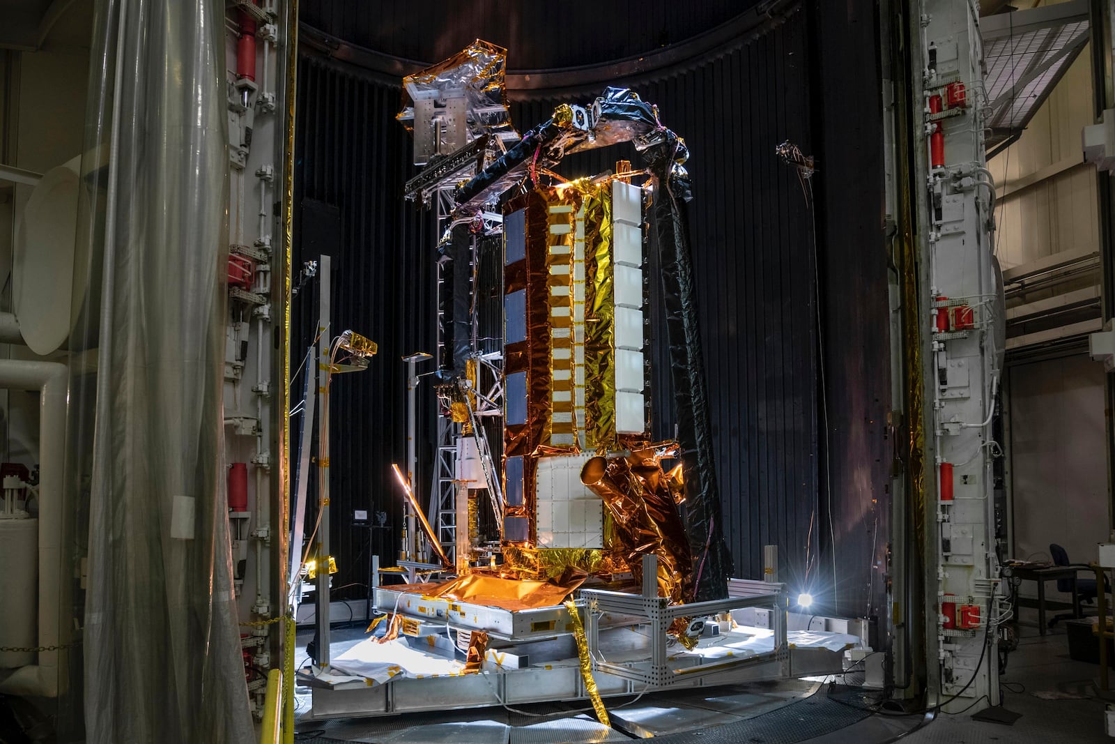 This photo provided by NASA shows part of the NISAR (NASA-ISRO Synthetic Aperture Radar) satellite resting in a thermal vacuum chamber in August 2020 at NASA's Jet Propulsion Laboratory in La Cañada Flintridge, Calif. (NASA/JPL-Caltech via AP)