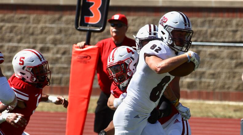 Alma’s Gage Krueger runs for a touchdown after a catch against Wittenberg in the second quarter on Saturday, Sept. 23, 2023, at Edwards-Maurer Field in Springfield. David Jablonski/Staff